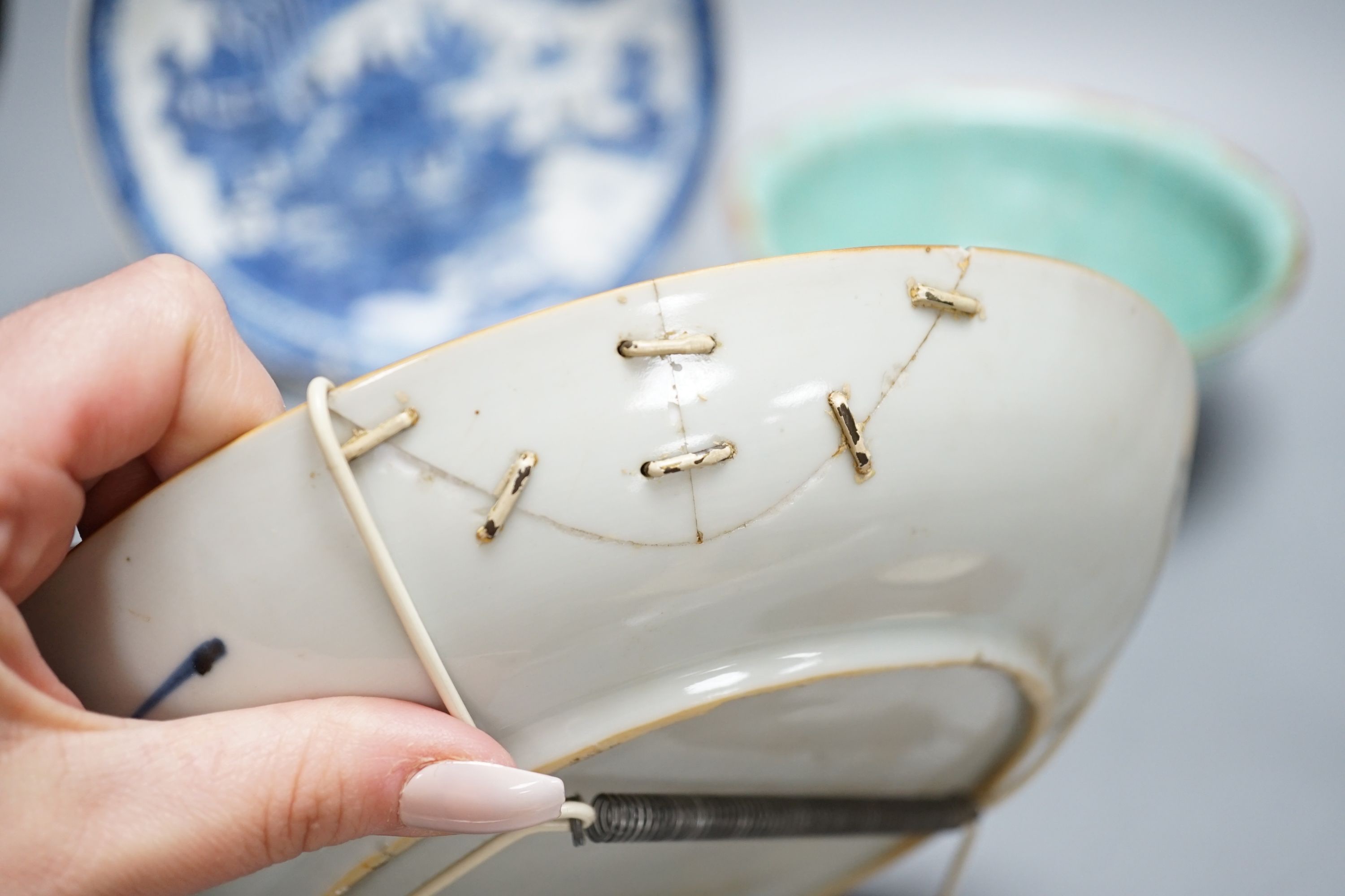 A 19th century blue and white dish, 22cm, together with three others